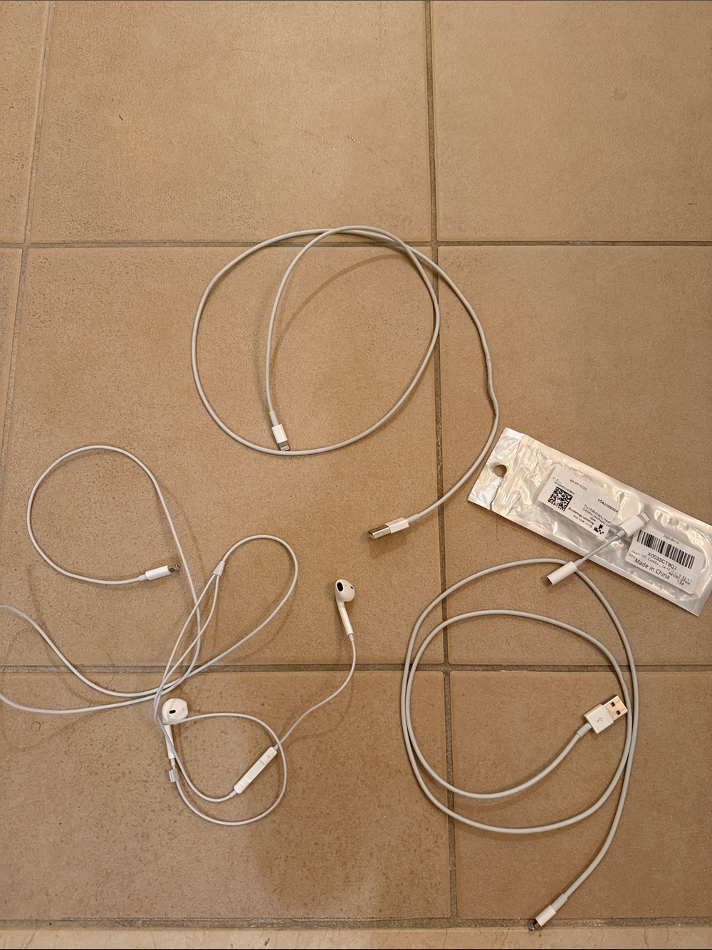Apple White Lightning Cables and Wired Earbuds
